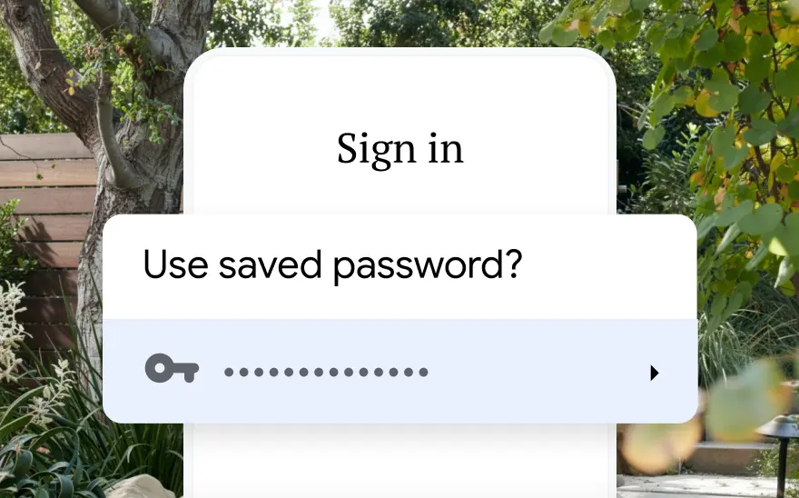 A sign in page for a trip reservation asks to use a saved password. In the background is a nature scene.